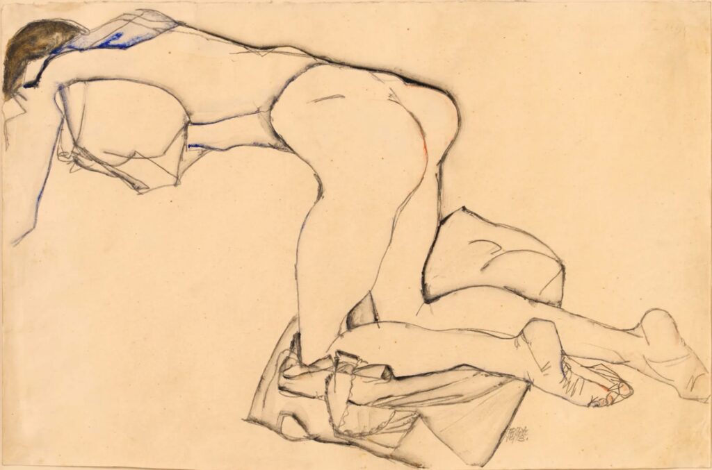A sketch by Odilon Redon depicting a nude young woman lightly draped in a blue blouse, kneeling on a cloth with her body bent forward and one leg extended, rendered in soft pencil and muted tones against a warm, neutral background.