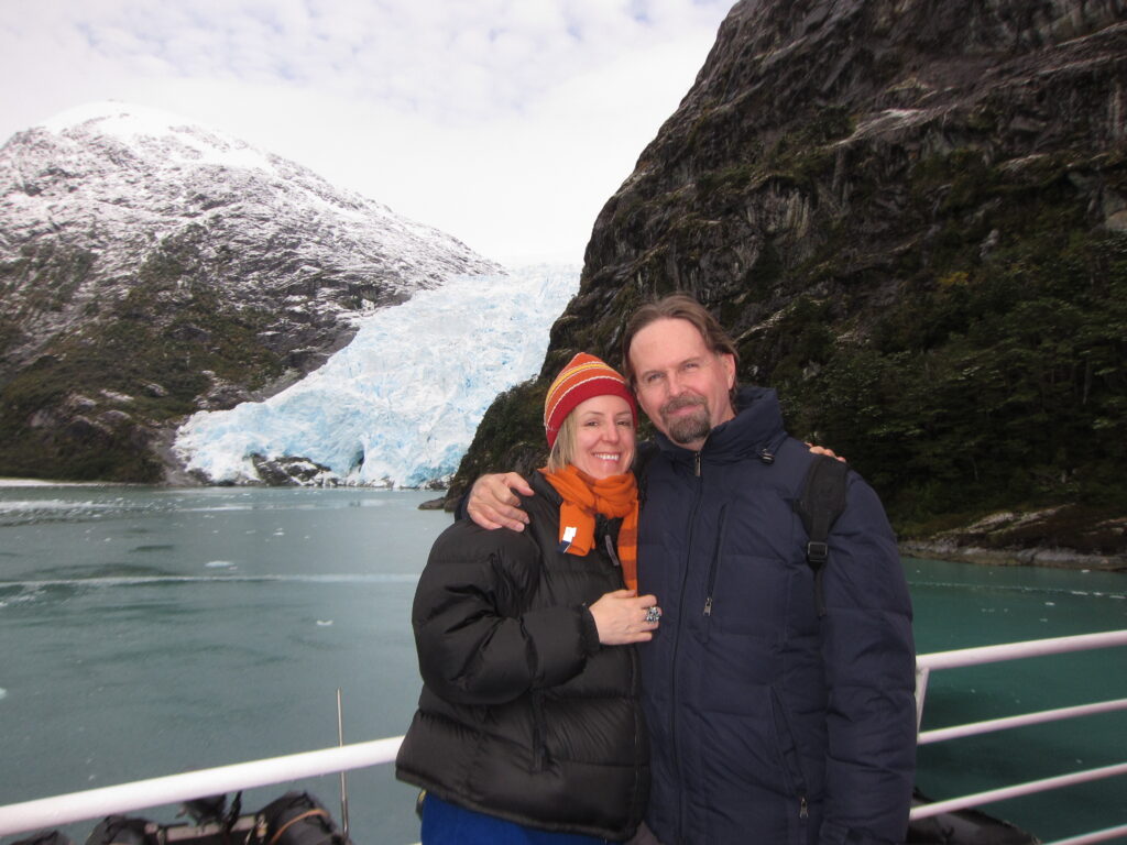 Kim and Ciara on the deck of a cruise ship with the Cape Horn Glacier in the background