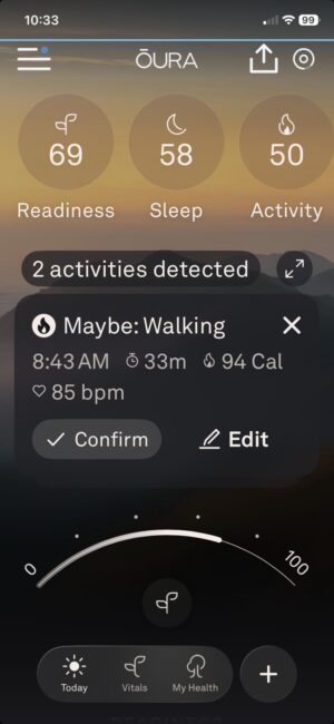 Screenshot of the Oura app showing low readiness, sleep, and activity scores alongside a notification labeling a recorded workout as “Maybe: Walking.” The humorous activity misclassification reflects the article’s playful frustration with wearable fitness tracking technology.