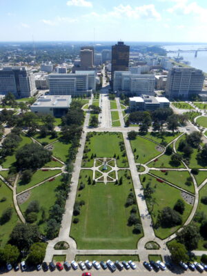 View from the Louisiana State Capitol overlooking its formal gardens and downtown Baton Rouge toward the Mississippi River.